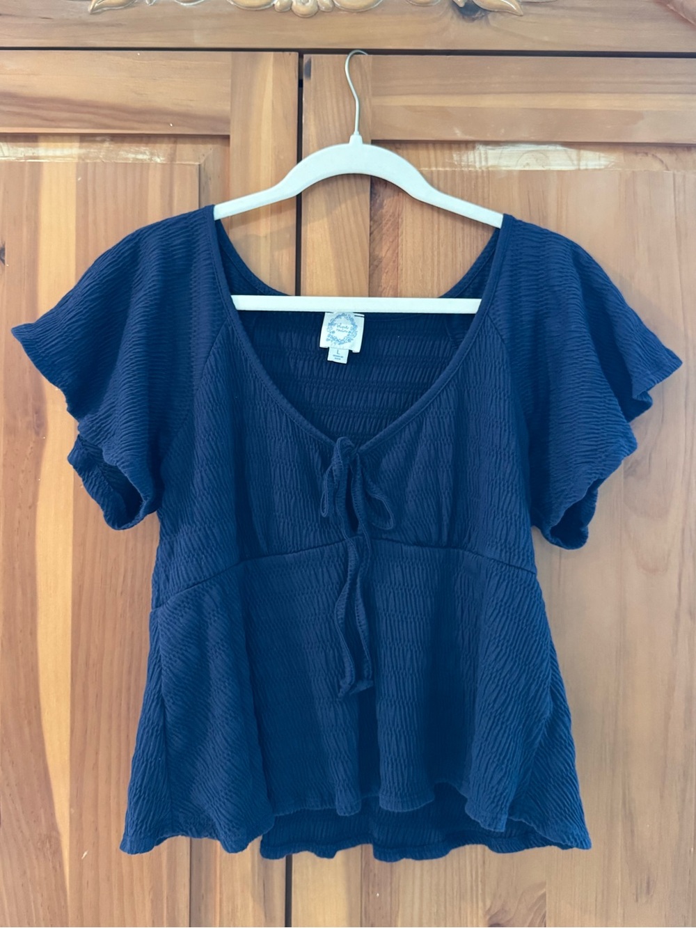 Francesca's Collections Navy Tie-Front Flutter Sleeve Top
